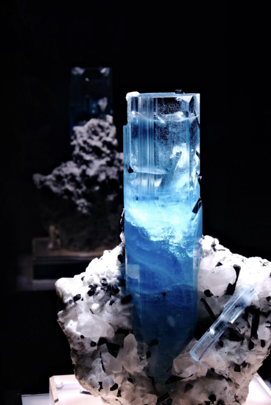 Faceted Aquamarine gemstone, deep ocean blue beryl, clear blue crystal, minimalist gem photography