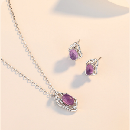 Amethyst necklace and earrings worn together as a set, professional and quiet aesthetic