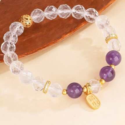 Close-up of 7.5mm white quartz and 8.5mm amethyst beads