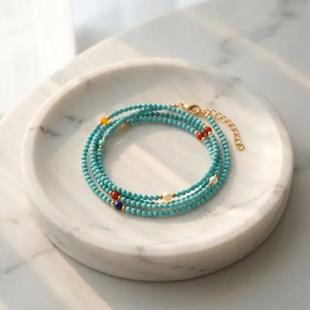 Three Turquoise necklaces in 40cm 50cm 60cm lengths shown together, different drop length comparison, sky-blue Turquoise beads with gold spacers