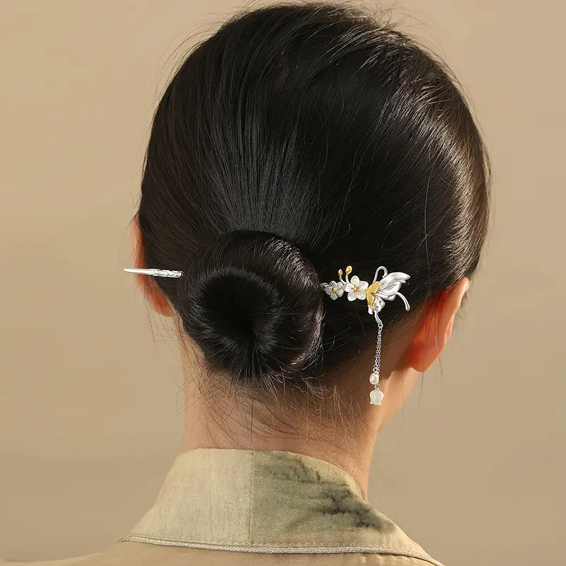 Buyao hairpin worn in traditional updo, butterfly flower hair ornament, feminine chinese traditional hair styling, delicate dangling hairpin