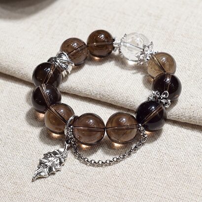 Natural tea quartz bracelet 15-16mm with clear quartz and alloy leaf tassel