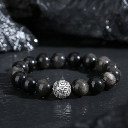 Black Obsidian bracelet with S925 silver Fu character bead, 12mm polished round obsidian beads, black and silver bracelet on white background, minimalist protective jewelry