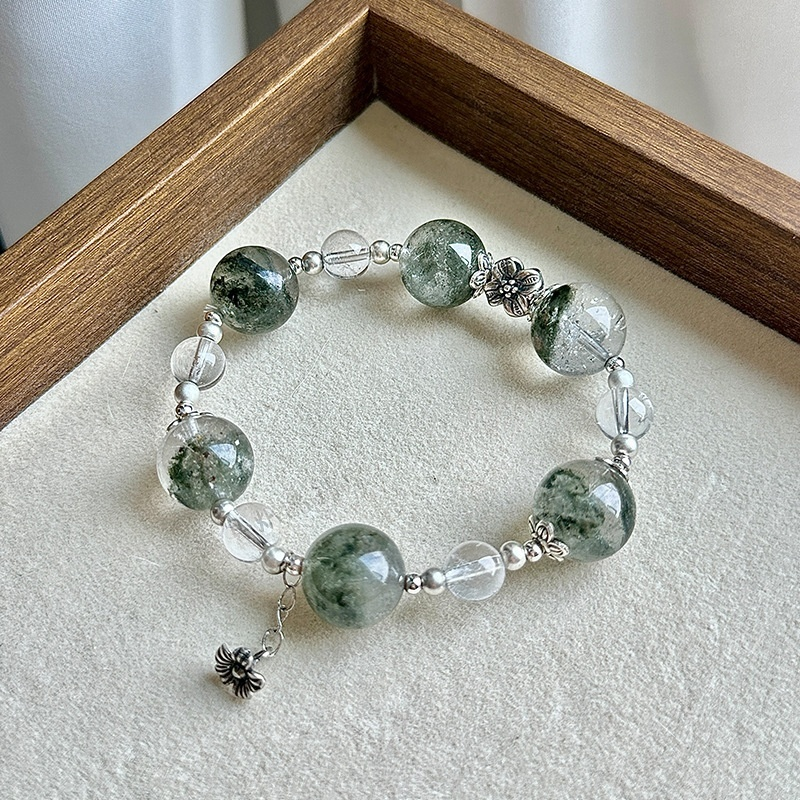Product Image Alt Text: Green Phantom Crystal bracelet, 14mm polished round beads, antique silver floral accents, layered green phantom quartz on wrist, minimalist natural crystal jewelry
