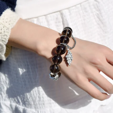 Natural tea quartz bracelet 15-16mm with clear quartz and alloy leaf tassel
